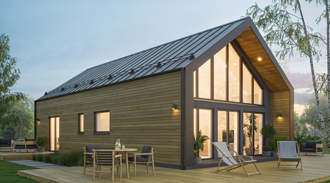 Scandinavian prefab barn homes surrounded by peaceful natural landscapes.